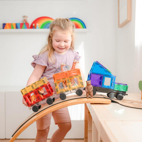 child playing with connetix magent tiles