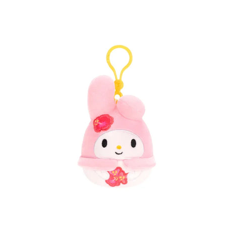 Pink Hello Kitty clip-on plush toy with flower detail, collectible stuffed keychain