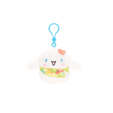 Cute white plush keychain toy with blue clip, floral bandana, and pink bow