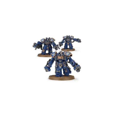 Three blue armored Space Marine Centurion Assault Squad miniatures on display