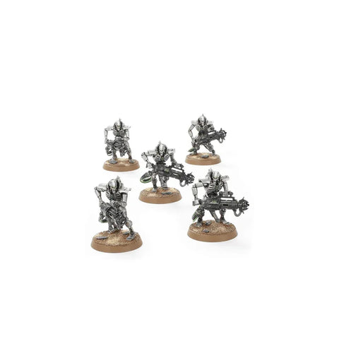 Five metallic robot miniatures with sci-fi guns on desert bases, tabletop gaming figures.