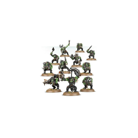 Set of painted green miniature orc warriors with weapons on display bases, tabletop gaming figures