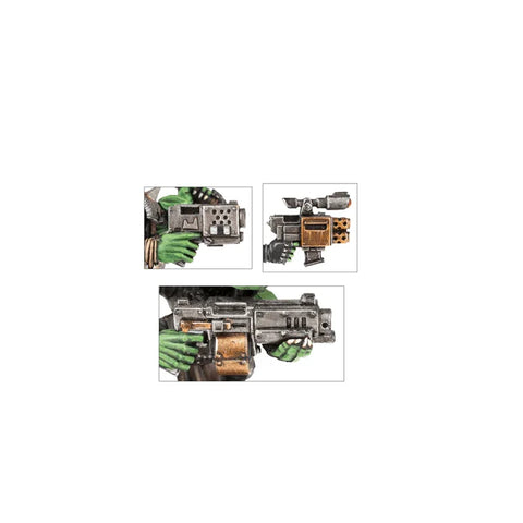 Close-up of Ork miniatures holding detailed sci-fi weapons, tabletop gaming accessories.