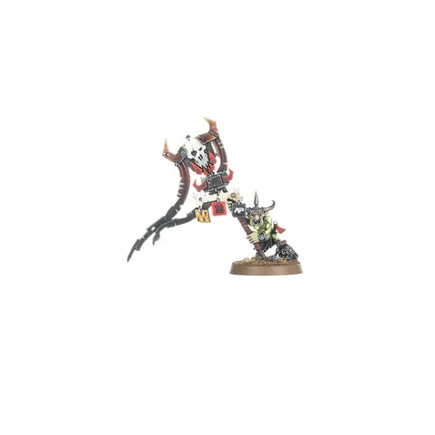 Painted orc war mini figure with mechanical arm and weapons on a display base