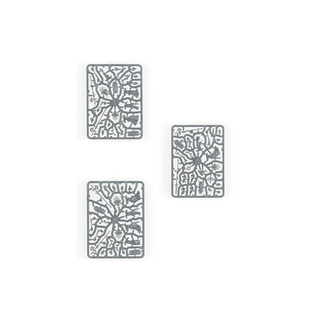 Three plastic model sprues with intricate miniature parts for tabletop gaming