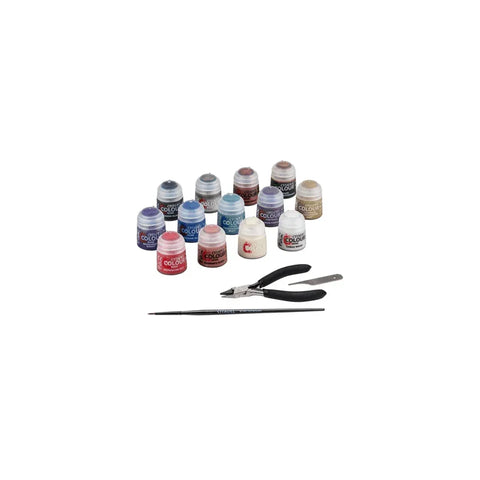Warhammer 40k miniature paints set with paint pots, brush, clippers, and sculpting tool.