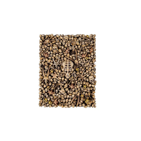 Tabletop gaming base decorated with detailed miniature skulls and bones, suitable for wargames.