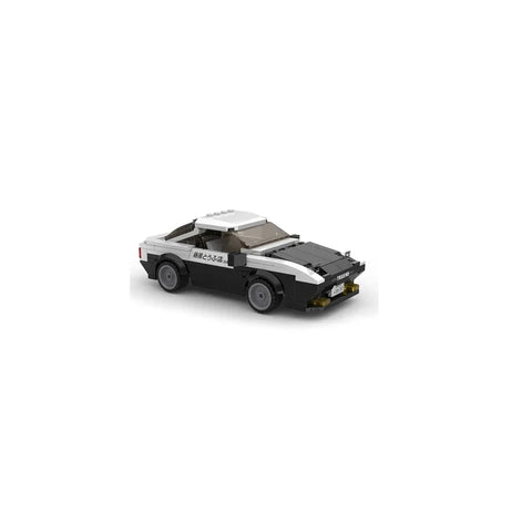 Black and white toy sports car building set with Japanese decals, collectible car model
