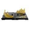 Gold Transformers Bumblebee helmet parts on black display stand, collectible toy accessory.