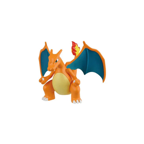 Charizard plastic model kit figure with orange body and blue wings on white background