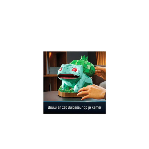 Hands assembling a 3D Bulbasaur model kit on a table, collectible toy for kids and fans.