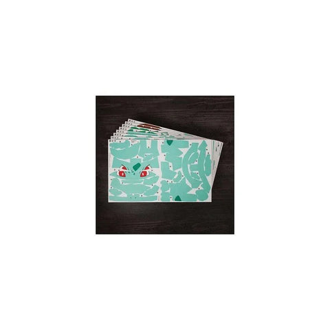 Bulbasaur 3D model kit sheets with printed parts on a dark surface, collectible toy