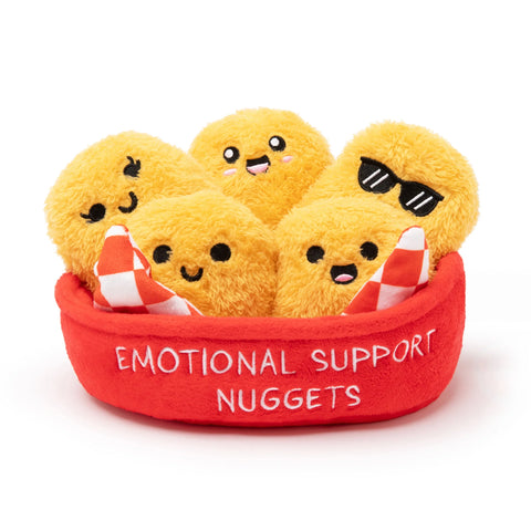 Plush toy chicken nuggets with smiling faces in red basket labeled Emotional Support Nuggets