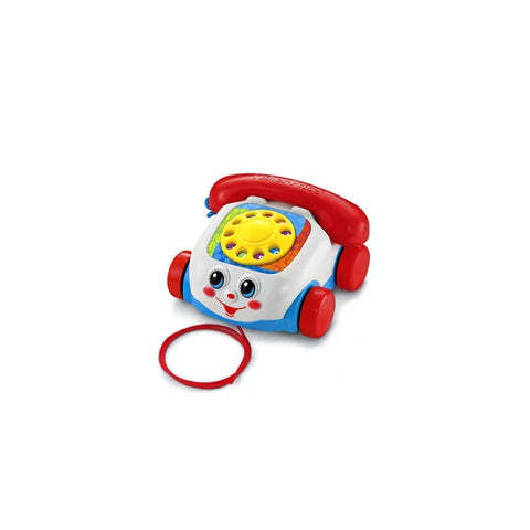 Classic toy rotary phone with red wheels, smiling face, and pull string on white background