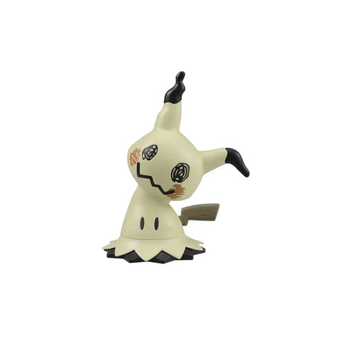 Mimikyu Pokemon model kit toy figure, cream and black, on white background