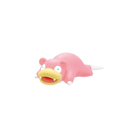 Pink Slowpoke model kit toy figure, cartoon style collectible on white background