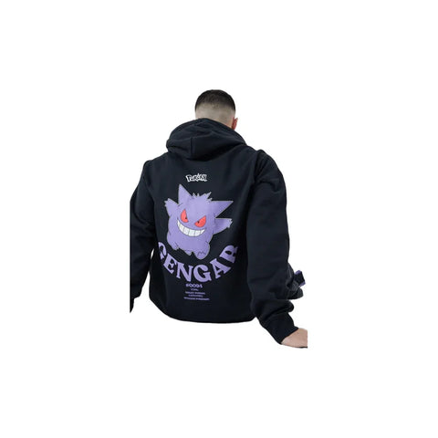 Black hoodie featuring large purple Gengar graphic from Pokémon, worn by a seated person.