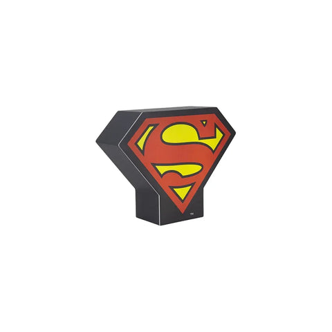 Superman logo shaped night light, red and yellow S emblem on black background.