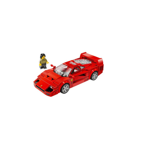 Red toy race car building set with mini driver figure, detailed sports car design