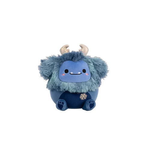 Plush navy blue bigfoot toy with furry head, horns, and snowflake detail, kids collectible