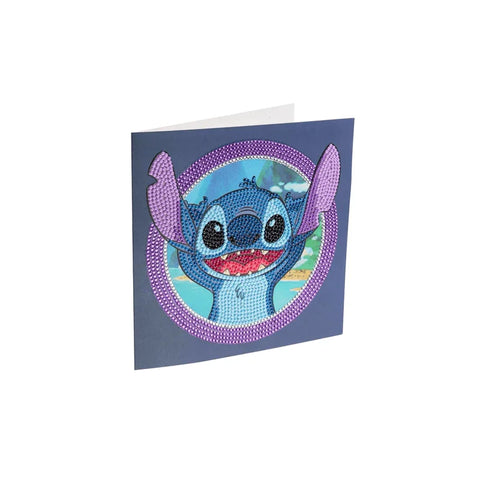Crystal art card with cartoon blue alien character, sparkly design, tropical background