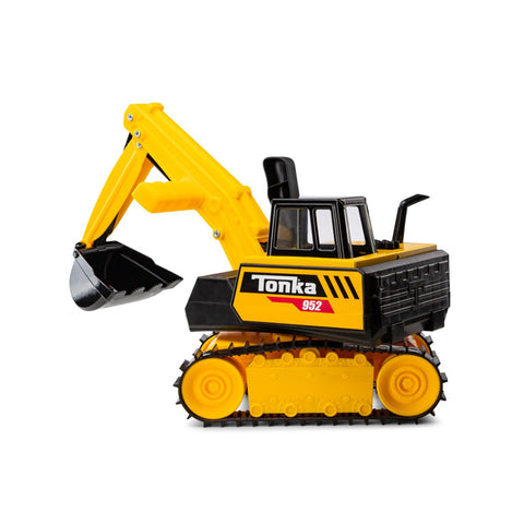 Yellow and black toy excavator with tracks and a large front scoop on white background