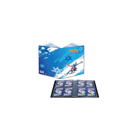 Pokemon card binder featuring Greninja design with open pages displaying trading cards