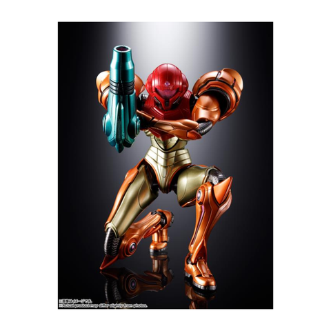 Action figure of armored sci-fi character in orange suit with arm cannon, collectible toy