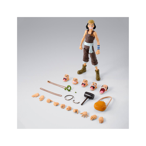 Anime action figure with interchangeable faces, hands, and accessories on gray background