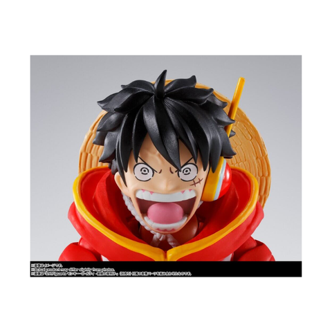 Anime action figure with black hair, wide open mouth, red jacket, and straw hat collectible toy