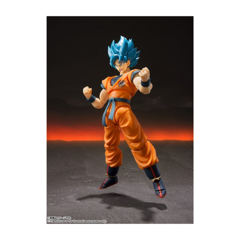 Anime action figure with blue hair and orange martial arts uniform in dynamic pose