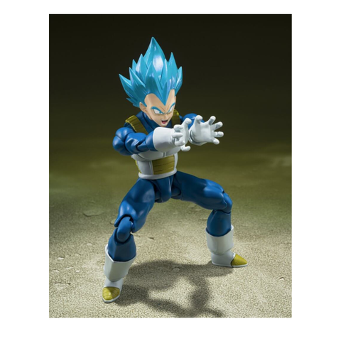 Blue-haired anime action figure in dynamic pose on textured surface