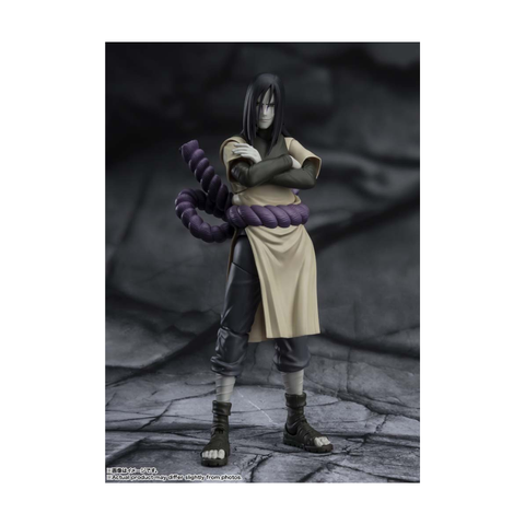 Anime action figure with long black hair, crossed arms, and a purple rope belt on rocky base