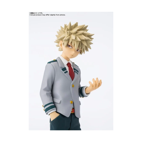 Anime character figure in school uniform with spiky blond hair, collectible toy