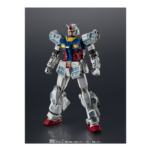 Highly detailed robot action figure with blue, red, and white armor on a dark background