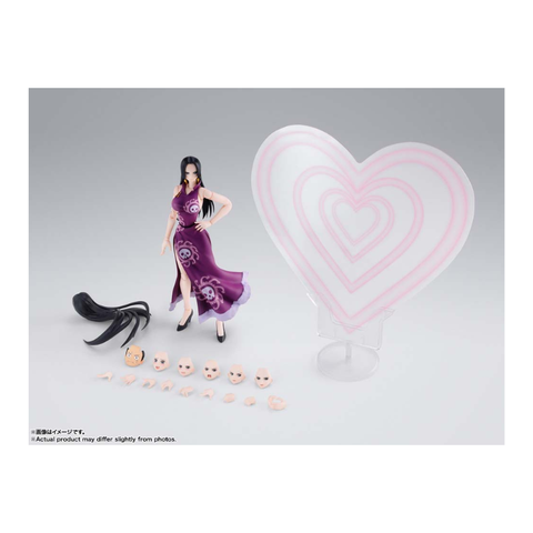 Anime action figure in purple dress with interchangeable faces, hands, and heart accessory.