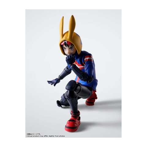 Anime action figure in kneeling pose with blue suit, red shoes, and yellow bunny-eared hood