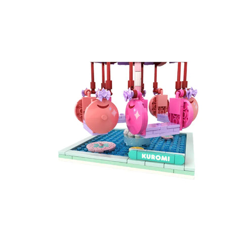 Pink and purple Kuromi themed building block toy carousel on a blue base