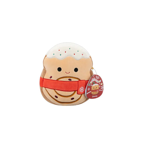 Cute cinnamon roll plush toy with smiling face, red sash, and frosted top with sprinkles
